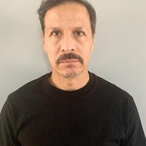 Photo of artist Claudio Riveros