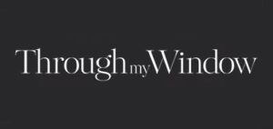 A sleek, black background with the words "Through my Window" written in elegant white font.